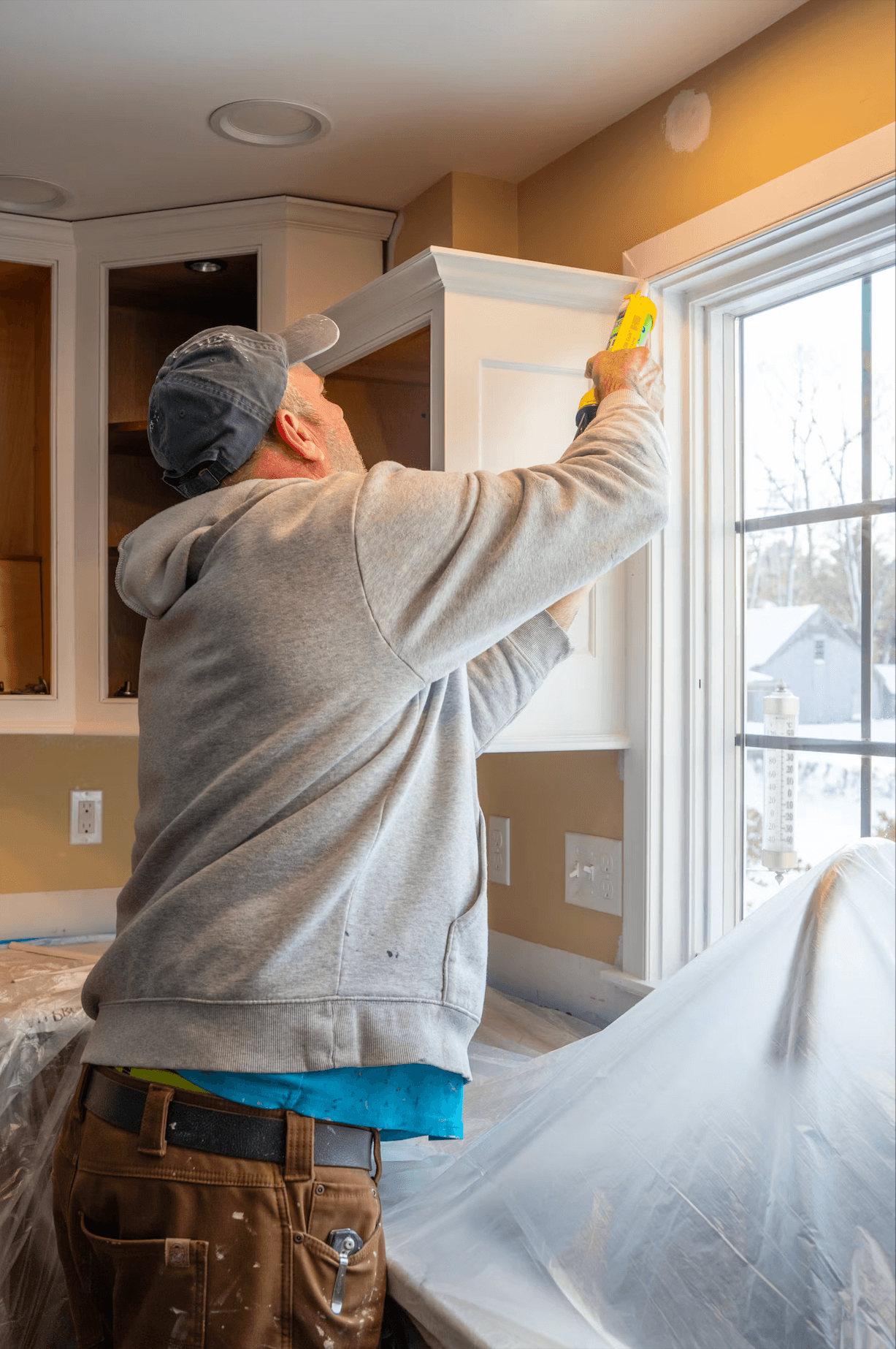 Skilled tradesperson performing residential renovation work